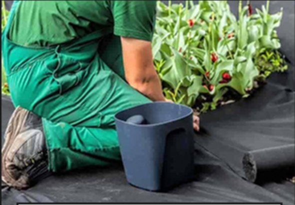 Rolă de material nețesut